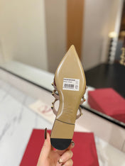 VALENTINO 26S STUDDED FLAT MULES IN DARK RED PATENT CALFSKIN