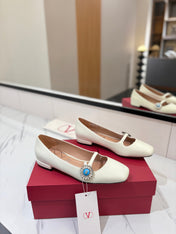 VALENTINO 26S MARY JANE FLATS IN WHITE CALFSKIN WITH CRYSTAL FLOWER