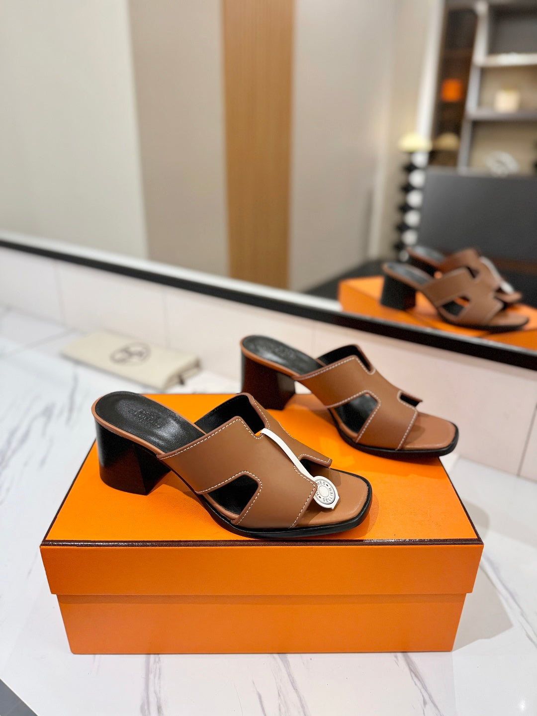 HM 26S HELIA SANDAL 70MM IN BROWN AND BLACK CALFSKIN
