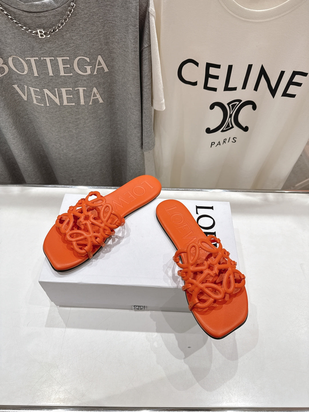 LOEWE 26S PETAL ANAGRAM SLIDE IN BURNT ORANGE CALFSKIN