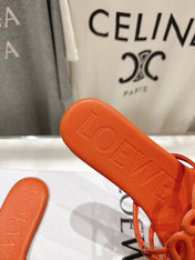 LOEWE 26S PETAL ANAGRAM SLIDE IN BURNT ORANGE CALFSKIN