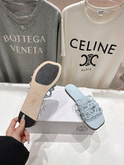 LOEWE 26S PETAL ANAGRAM SLIDE IN LIGHT BLUE CALFSKIN