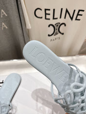 LOEWE 26S PETAL ANAGRAM SLIDE IN LIGHT BLUE CALFSKIN