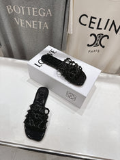 LOEWE 26S PETAL ANAGRAM SLIDE IN BLACK PATENT CALFSKIN