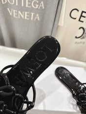 LOEWE 26S PETAL ANAGRAM SLIDE IN BLACK PATENT CALFSKIN