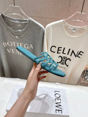 LOEWE 26S PETAL ANAGRAM SLIDE IN TEAL BLUE CALFSKIN