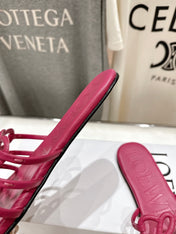 LOEWE 26S PETAL ANAGRAM SLIDE IN DARK ROSE PINK CALFSKIN