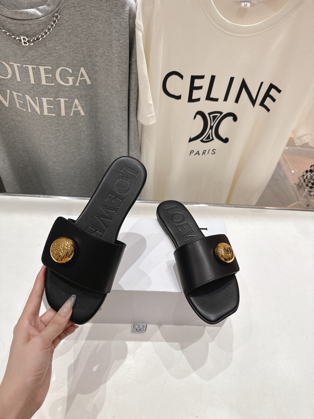 LOEWE 26S PEBBLE SLIDE IN BLACK CALFSKIN GOLD HARDWARE
