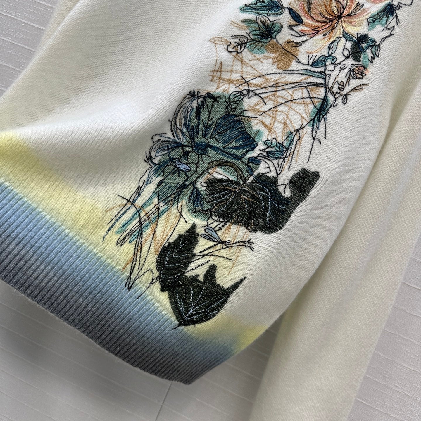 DIOR CASHMERE SWEATER WITH FLORAL EMBROIDERY 276200