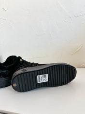 TIME OUT SNEAKER IN BLACK MONOGRAM EMBOSSED SUEDE WITH FLEECE LINING