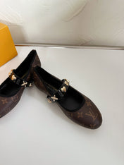 ROMY FLAT BALLERINA IN CHOCOLATE BROWN MONOGRAM CALFSKIN