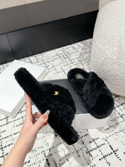 CROSS STRAP SLIPPER IN BLACK SHEARLING