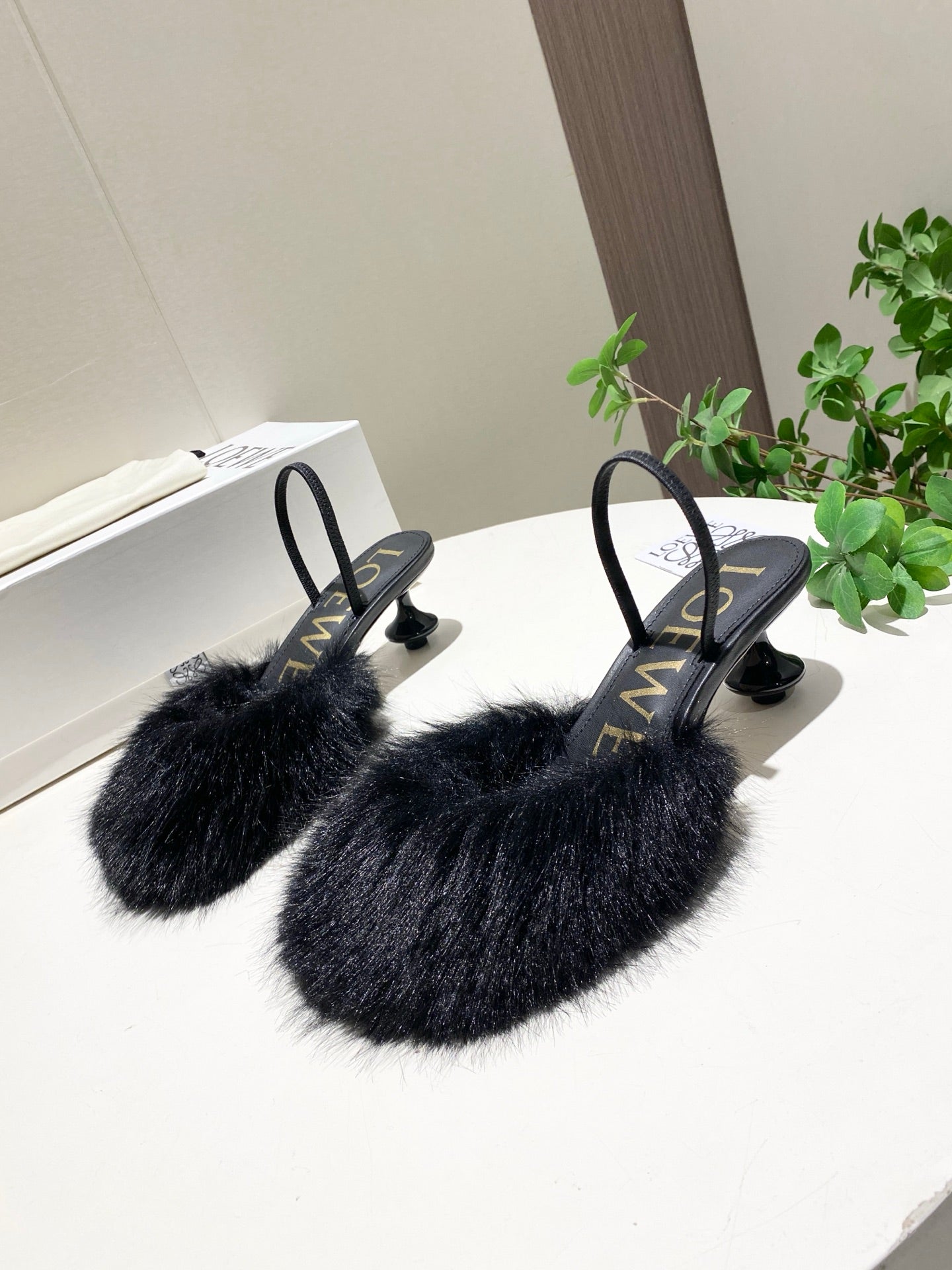 LOEWE 26S OPEN-BACK HIGH HEELS 60MM IN BLACK CALFSKIN WITH FUR