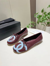 CHANEL 26S FLATS IN DARK RED LAMBSKIN WITH BOW