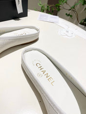 CHANEL 26S FLAT MULES IN WHITE LAMBSKIN