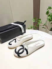 CHANEL 26S FLAT MULES IN WHITE LAMBSKIN