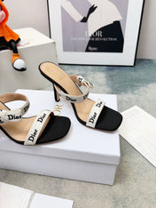 DIOR 26S HEELED SANDAL 95MM IN BLACK AND WHITE WITH J'ADIOR STRAPS CANVAS