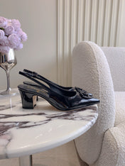 HIGH SLINGBACKS 65 MM IN BLACK PATENT CALFSKIN
