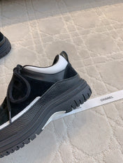 CHANEL 25S TRAINERS 40MM IN BLACK AND WHITE CALFSKIN AND SUEDE