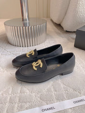 CHANEL 25S LOAFERS WITH LARGE LOGO IN BLACK CALFSKIN GOLD HARDWARE