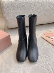 MIUMIU 26S HIGH-HEELED ANKLE BOOTS 70MM IN BLACK CALFSKIN