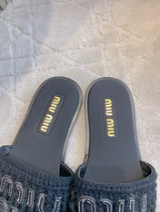 MIUMIU 26S SLIDE SANDALS IN BLACK CALFSKIN AND WOOL
