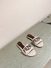FENDI SIGNATURE MULE SLIDES IN WHITE FIBRE WITH BROWN EMBROIDERED LOGO