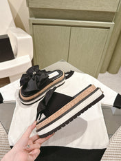 CC SLIPPERS WITH SILK BOW IN BLACK COWHIDE