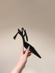 AIMÉE HIGH 8 CM SLINGBACK PUMPS IN BLACK PATENT CALFSKIN