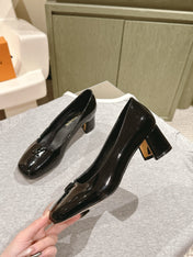 SWING HIGH PUMP 55 MM IN BLACK PATENT CALFSKIN