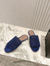 ALAIA PERFORATED SLIDE SANDALS 25S IN NAVY BLUE SUEDE