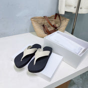 THE ROW 26S THONG SANDALS IN BLACK RUBBER  WITH WHITE STRAPS CALFSKIN
