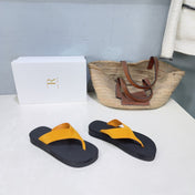 THE ROW 26S THONG SANDALS IN BLACK RUBBER  WITH GOLD YELLOW STRAPS