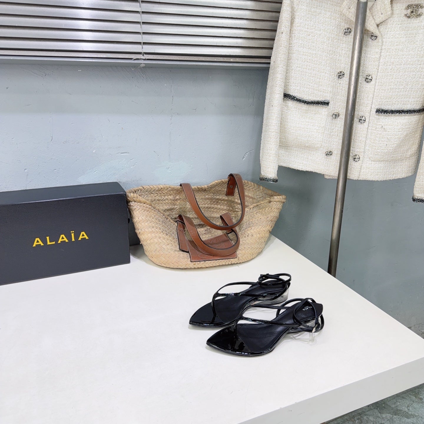 ALAIA 26S THONG SANDALS IN BLACK CALFSKIN