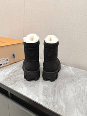 MARTIN ANKLE BOOTS IN BLACK SUEDE AND WHITE SHEARLING LINING