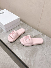 THICK-SOLED SLIDES IN LIGHT PINK SMOOTH LAMBSKIN LOGO WITH CRYSTALS