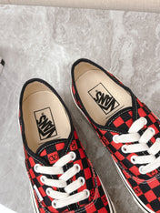VALENTINO 25S GARAVANI X VANS SNEAKERS IN RED MIX BLACK CANVAS