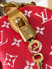 SPEEDY P9 BANDOULIÈRE 25 IN RED MONOGRAM CANVAS GOLD HARDWARE