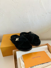 LV BLISS COMFORT MULE IN BLACK SHEARLING