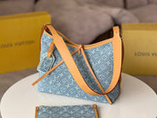 LV 25S CARRYALL 29 IN LIGHT BLUE DENIM MONOGRAM LEATHER TRIM