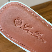 FLAT SLIPPERS IN WHITE LAMBSKIN OSTRICH SKIN