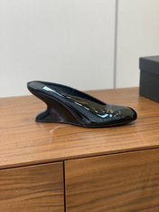 ALAIA 26S WEDGE MULES 70 MM IN BLACK GLOSSY CALFSKIN