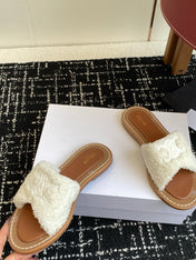 CELINE 26S TRIOMPHE FLAT SLIDES IN WHITE WOOL