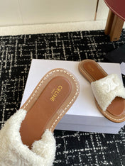 CELINE 26S TRIOMPHE FLAT SLIDES IN WHITE WOOL