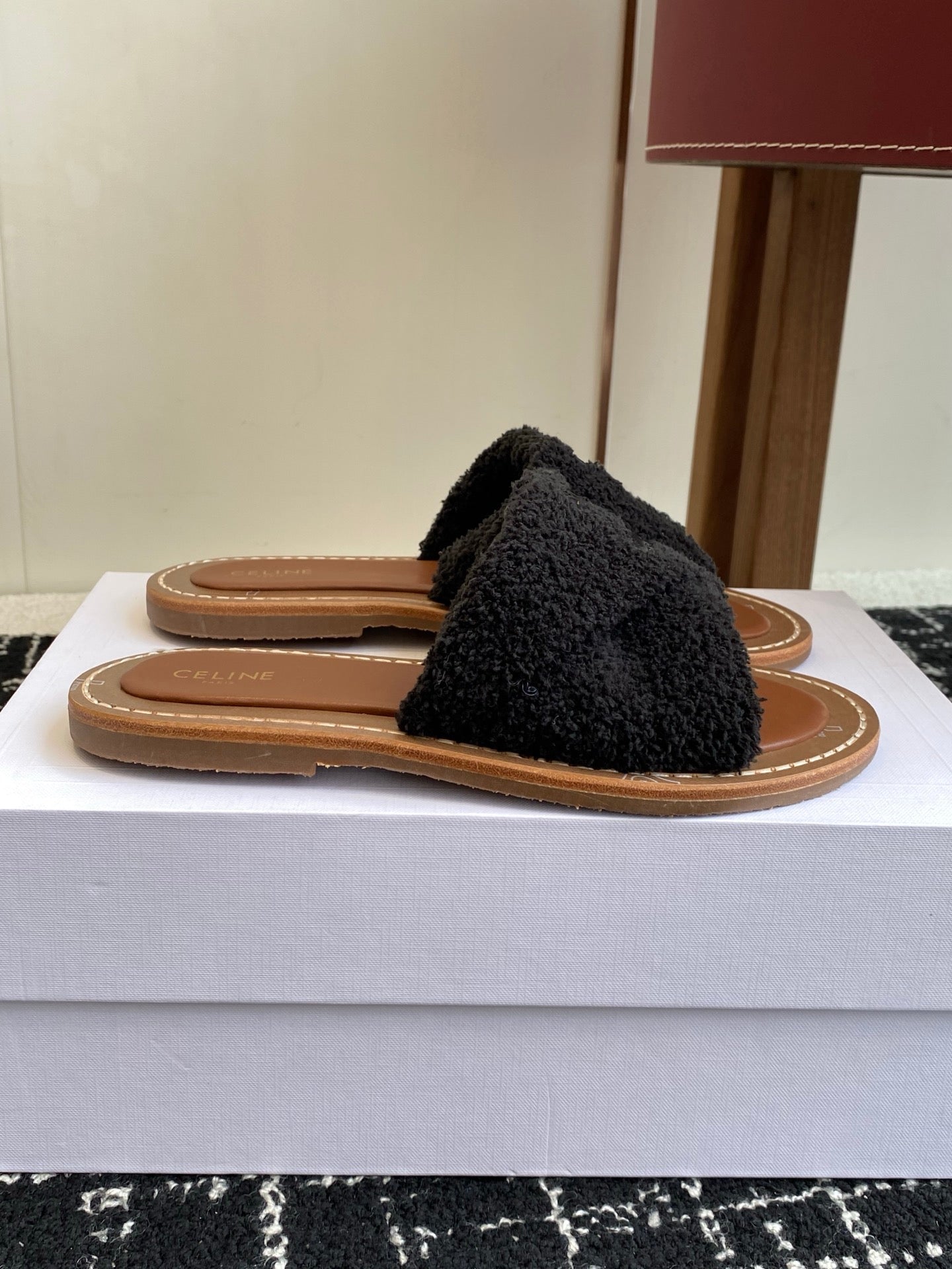 CELINE 26S TRIOMPHE FLAT SLIDES IN BLACK WOOL