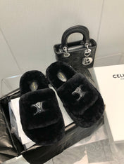 THICK-SOLED SLIPPER IN BLACK LAMB FUR