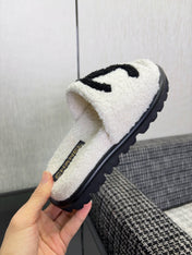 CHANEL 26S SLIDE SANDALS  IN BLACK AND WHITE SHEARLING