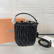 MATELASSÉ SMALL HANDBAG 17 IN BLACK LAMBSKIN