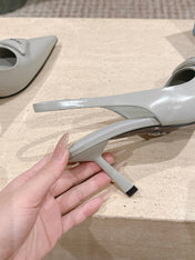 PRADA 26S POINTED-TOE SLINGBACK HEELS 75MM IN SOFT GRAY SHINY CALFSKIN