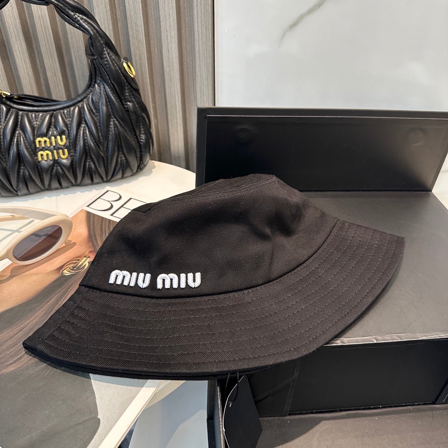 MIUMIU BUCKET HAT STYLE 31
